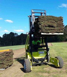 Barry loading the truck with our forklift
